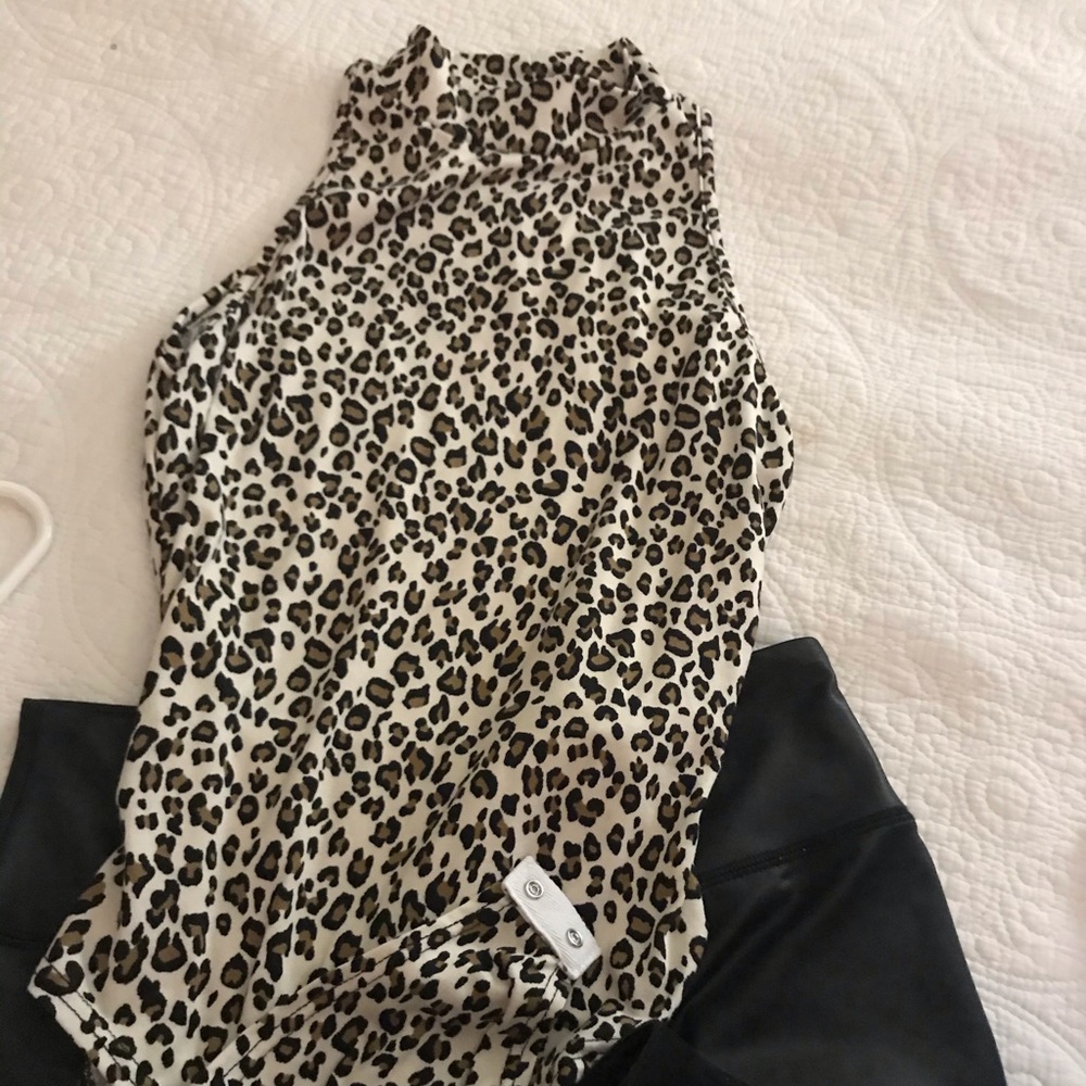 New stylish Tank body suit NEW never worn